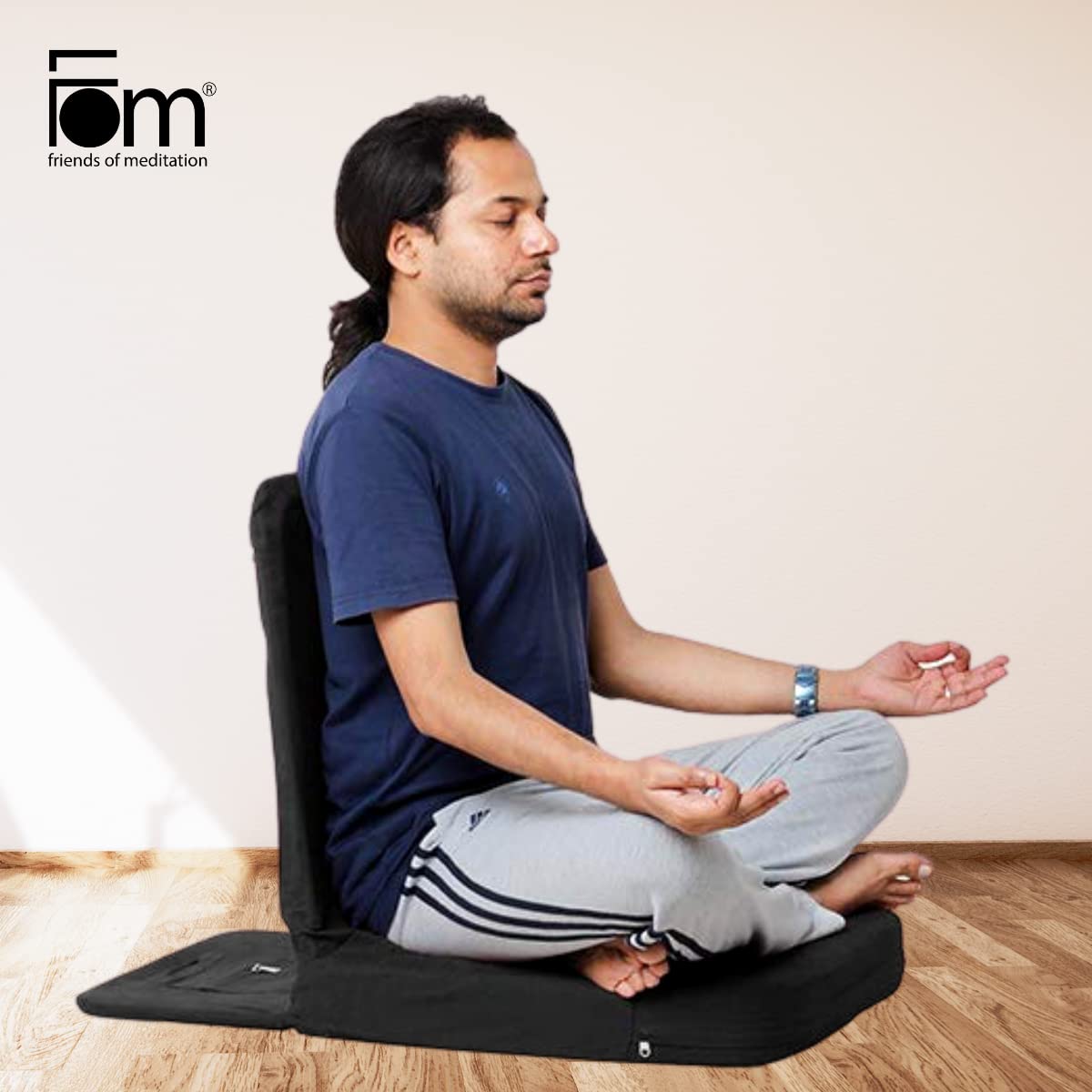 Person using a meditation cushion.